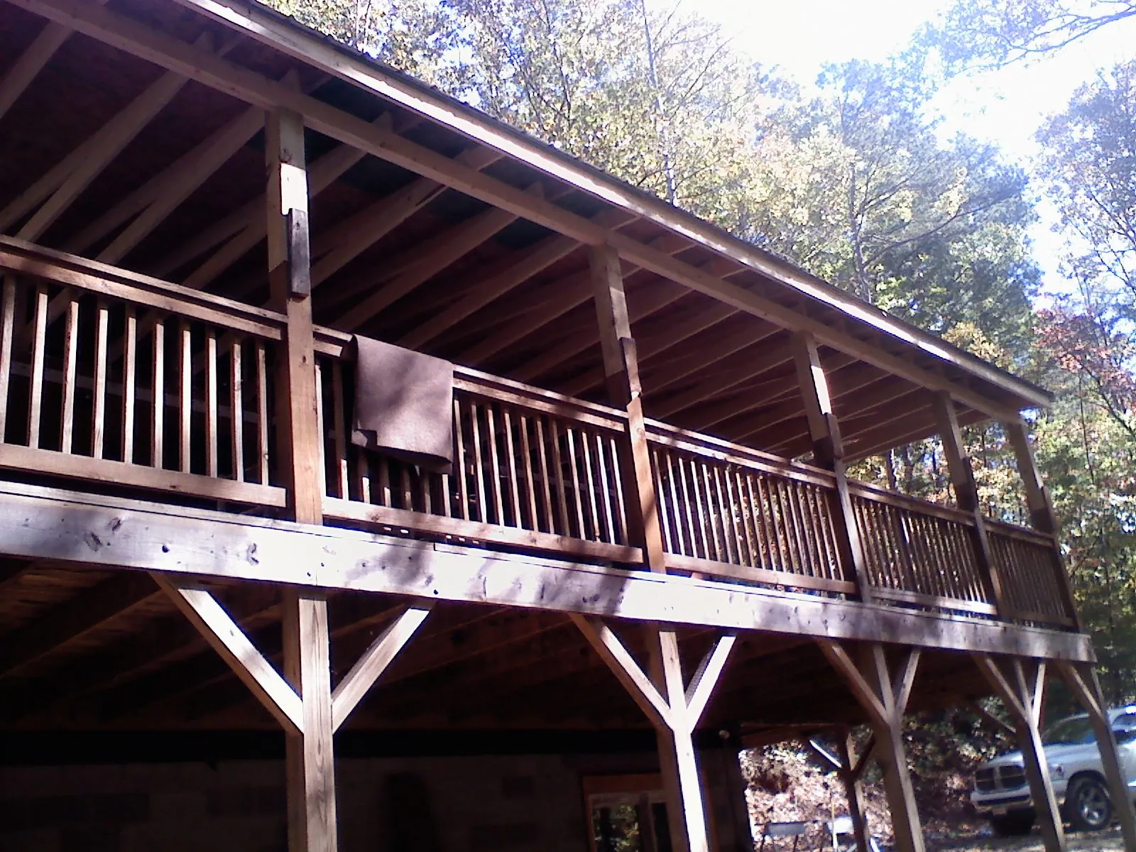 Timber framing under a new elevated porch and deck — Roof Leak Repair in Arlington by Roofing Brothers
